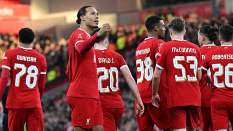 Virgil van Dijk celebrates scoring Liverpool's fourth goal in an FA Cup tie at home to Norwich