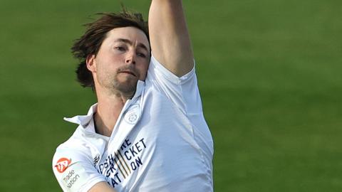 James Fuller bowls for Hampshire