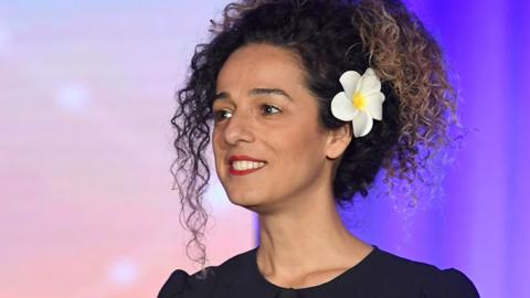 Masih Alinejad speaking at an event in 2018