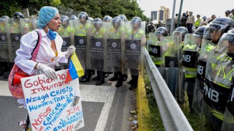 A woman demanding drugs for children with cancer at a health protest in Caracas