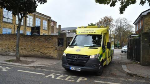 Ambulance leaving the school