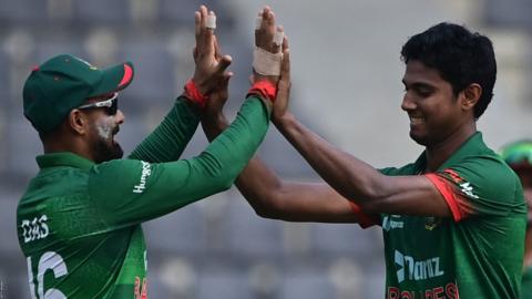 Bangladesh paceman Hasan Mahmud (right) celebrates with team-mate Litton Das after taking one of his five Irish wickets