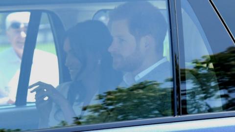 Harry and Meghan in a car