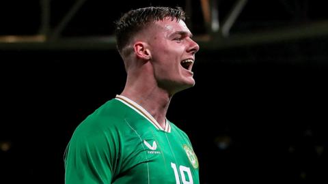 Evan Ferguson celebrates scoring his first Republic of Ireland goal