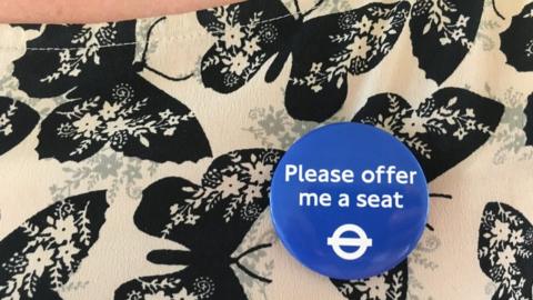 TfL's "Please offer me a seat badge"
