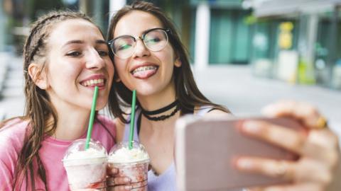 Stock image of teenagers taking a selfie