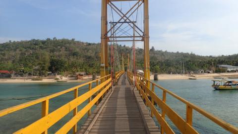 The "Yellow Bridge" which connects Nusa Lembongan and Nusa Ceningan, two islands located east of the resort island of Bali, Indonesia is seen on 29 November 2015