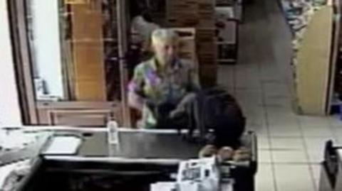 CCTV of woman in shop