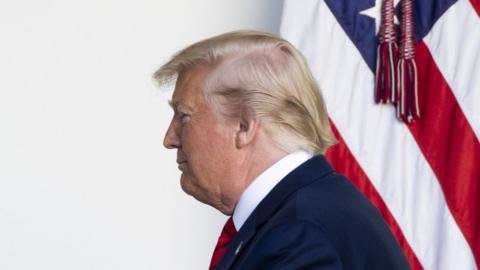 US President Donald J. Trump walks down the Colonnade upon his departure from an event hosting the 2019 Stanley Cup