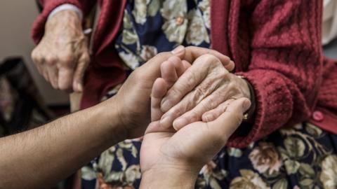 An elderly woman's hands