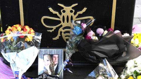 Tributes left for bombing victims