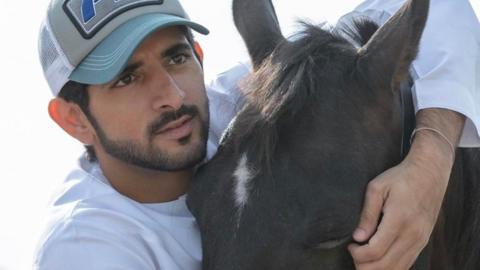 Crown Prince of Dubai with a horse