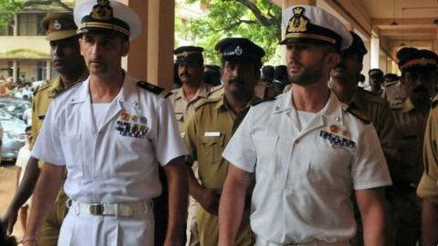 Massimiliano Latorre (centre-left) and Salvatore Girone (centre-right). File photo