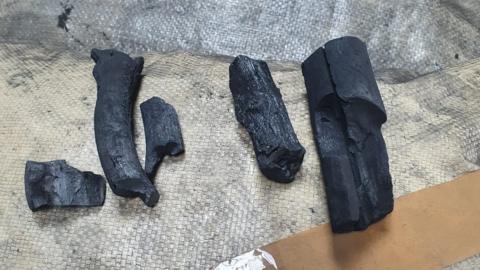 The cocaine was discovered in shipping containers, disguised as charcoal