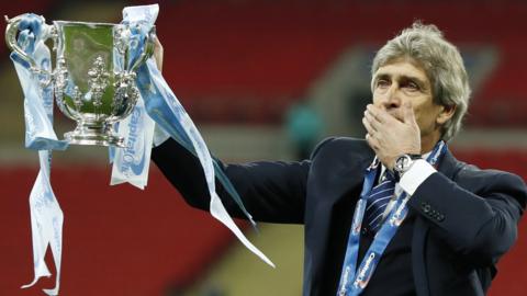 Manuel Pellegrini celebrates winning the Capital One Cup