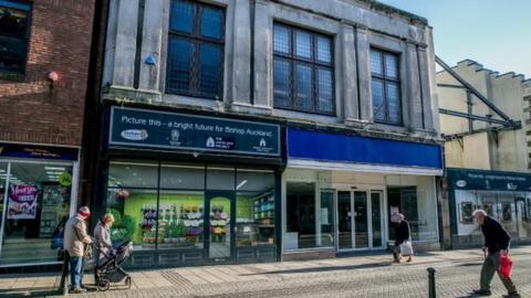 The former butcher's shop and WH Smith