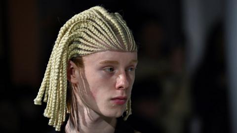 Model at the Comme Des Garcons fashion show in Paris