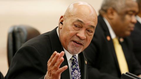 Suriname's President Desi Bouterse (L) attends a meeting with China's Premier Li Keqiang (not pictured) at the Great Hall of the People in Beijing on November 27, 2019.