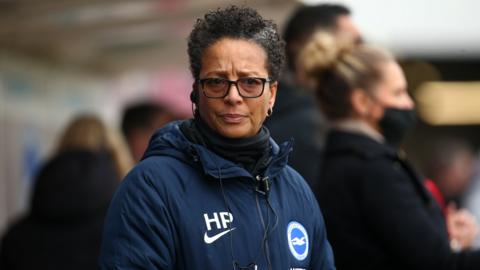 Hope Powell managing Brighton in the Women's Super League