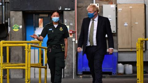 Prime Minister Boris Johnson wearing a face covering