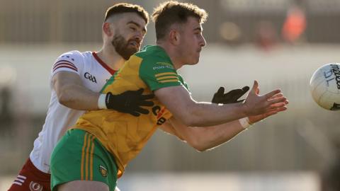 Tyrone's Padraig Hampsey battles with Donegal's Patrick McBrearty in the Division One League game in February