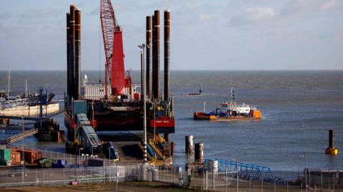 A dredger works to remove silt from the Harbour at the of Ramsgate, in Ramsgate,