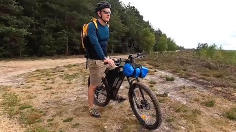 Jon Cuthill with his mountain bike