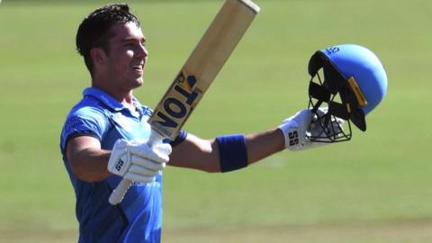 Dewald Brevis celebrates his century for Titans against Knights