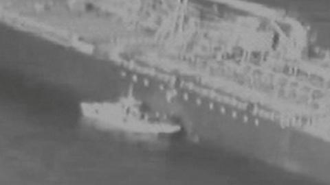 US military footage of Iran Revolutionary Guard removing a mine from the Kokuka Courageous Tanker