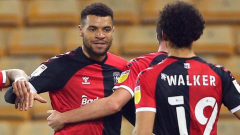 Maxime Biamou celebrates