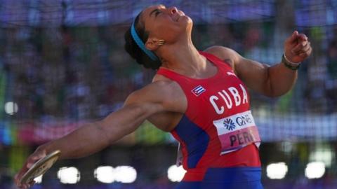 Yaime Perez in action during the women"s discus throw qualification