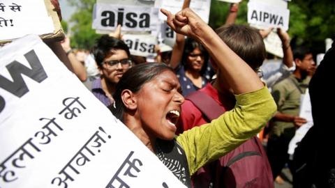 A woman reacts at a protest against the rape of an eight-year-old girl, in Kathua, near Jammu and a teenager in Unnao, Uttar Pradesh state, in New Delhi, India April 12, 2018