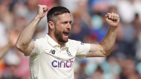 Chris Woakes celebrates a wicket