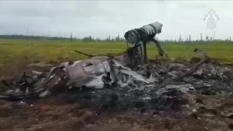 Ground video from crash site of helicopter in Russia