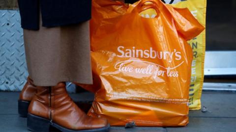 Sainsbury's bag with the slogan "live well for less"