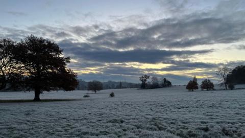 Picture taken at dawn at Hadleigh in Suffolk showing countryside, frost and broken cloud