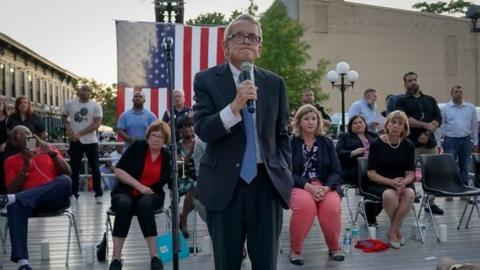 Mourners at a vigil for the victims of the mass shooting in Dayton, Ohio, demand action from politicians.