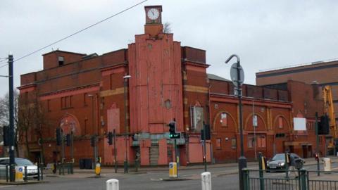 The multi-storey redbrick former theatre, nightclub and snooker hall stands on King Street in Oldham.