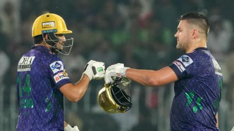 Hasan Nawaz and Rilee Rossouw punch gloves