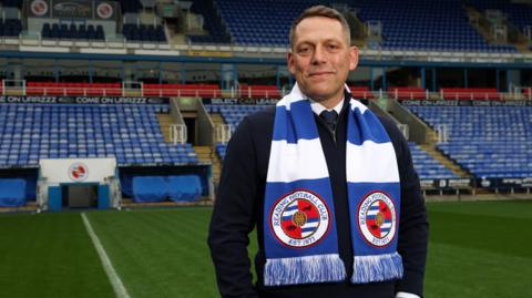 New Reading boss Leam Richardson poses for a photo after being unveiled as Royals manager