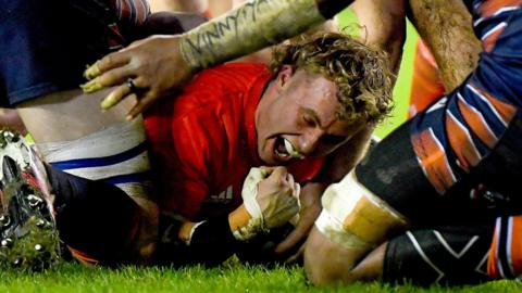 Craig Casey celebrates scoring for Munster