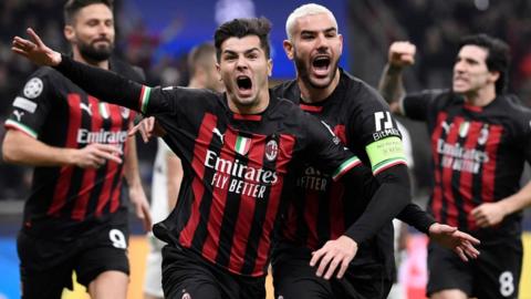AC Milan celebrate reaching the Champions League quarter-finals