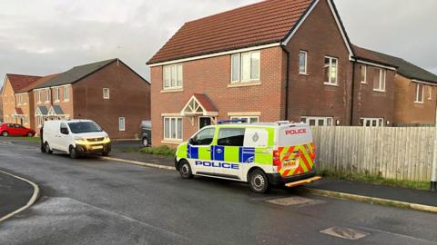 A police van outside a property in Haughton Road, Darlington