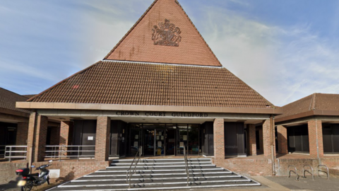 An exterior image of Guildford Crown Court, where Stephen Ireland and David Sutton are on trial accused of multiple child sex offences.