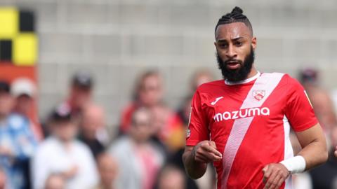 Rhys Bennett in action for Morecambe