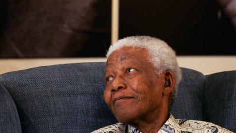 This file photo taken on October 09, 2006 shows South Africa"s former President Nelson Mandela attending the launch of his new book Mandela: The Authorised Portrait, in Johannesburg.