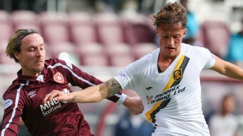 Ben Williamson (right) in action for Livingston