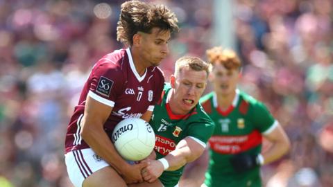 Mayo's Ryan O'Donoghue battles with Galway's Sean Fitzgerald