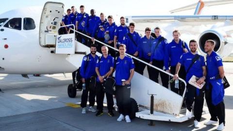 Inverness players board a plane for a match