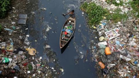 A boat travels through plastic